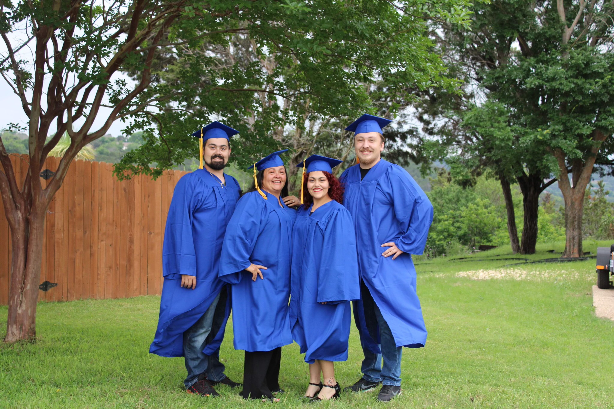 Family in graduation gowns